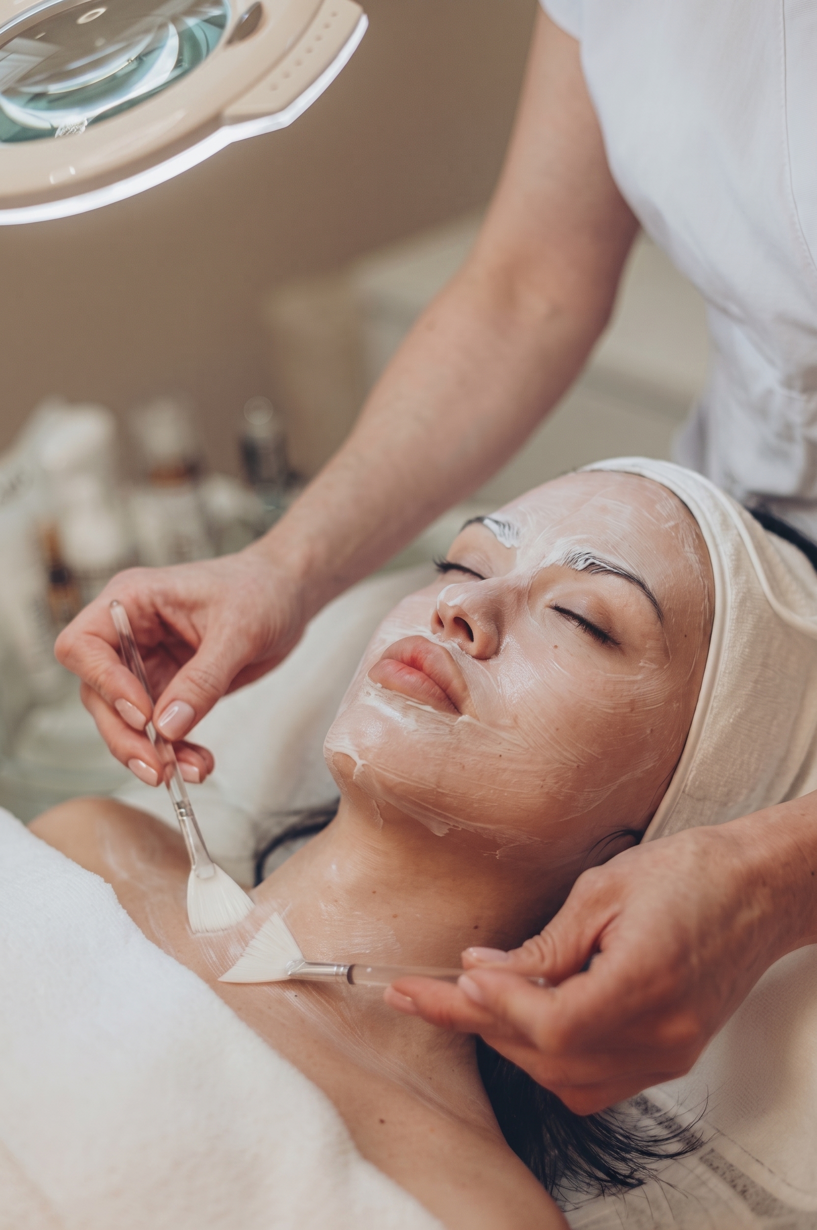 Medical professional consulting with patient in a modern aesthetics clinic